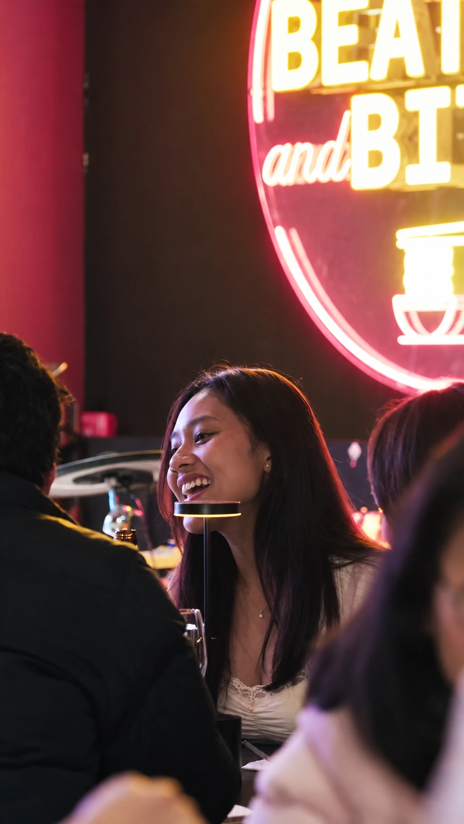 Friends enjoying a live music evening at Jaya
